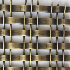 Architectural woven wire mesh from stainless steel painted for an antique brass finish